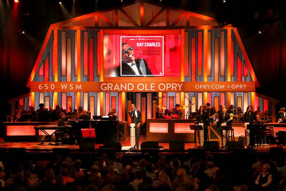 Performance on the Grand Ole Opry stage with the iconic barn backdrop